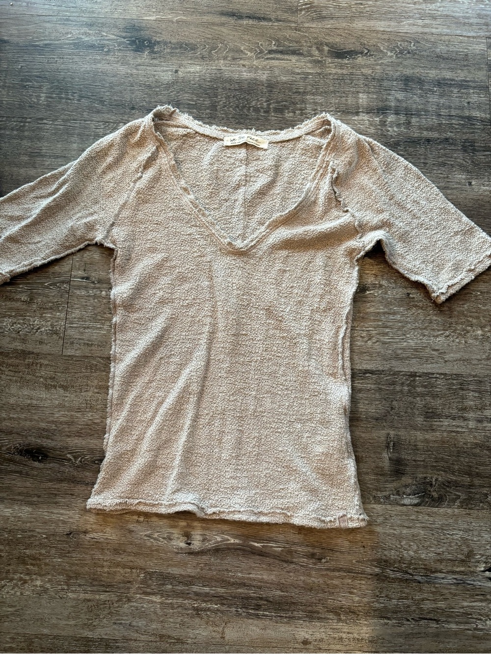 We The Free Textured V-Neck Short Sleeve Top in beige. “Jackrabbit”